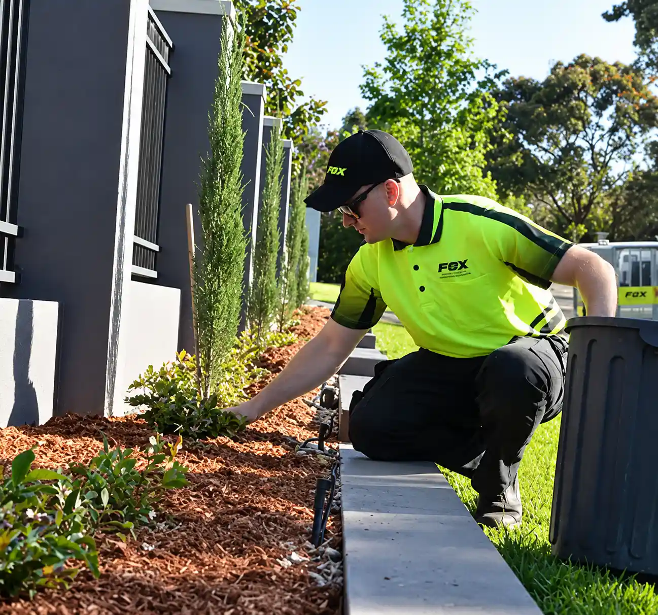 Fox Mowing operator maintaining a garden in Gordon ACT